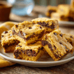 Gooey chocolate chip cookie bars made with yellow cake mix